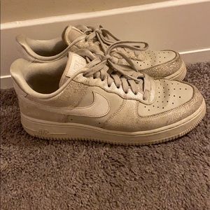 Women’s gold and beige Air Force 1s